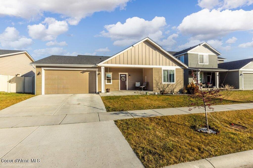 Photo of 5887 Gumwood Cir, Post Falls, ID 83854 (MLS # 26-1609)