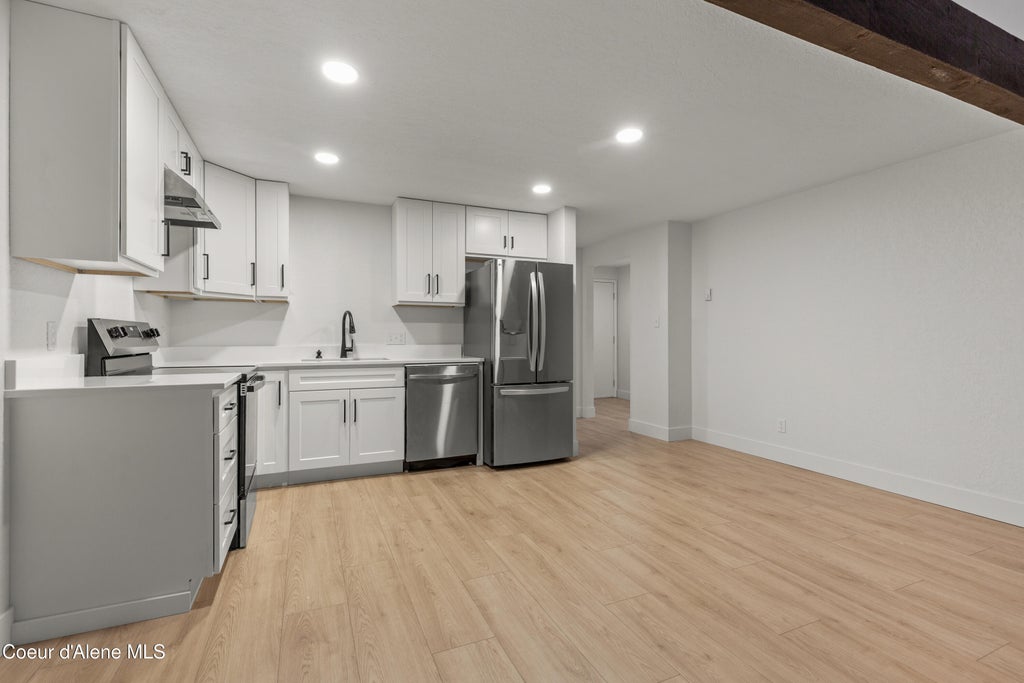 Photo of 5421 Fairway LN #UNIT 27, Rathdrum, ID 83858 (MLS # 26-10613)