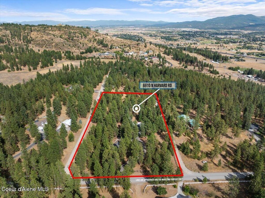 Photo of 6910 HARVARD Rd, Newman Lake, WA 99025 (MLS # 25-8239)