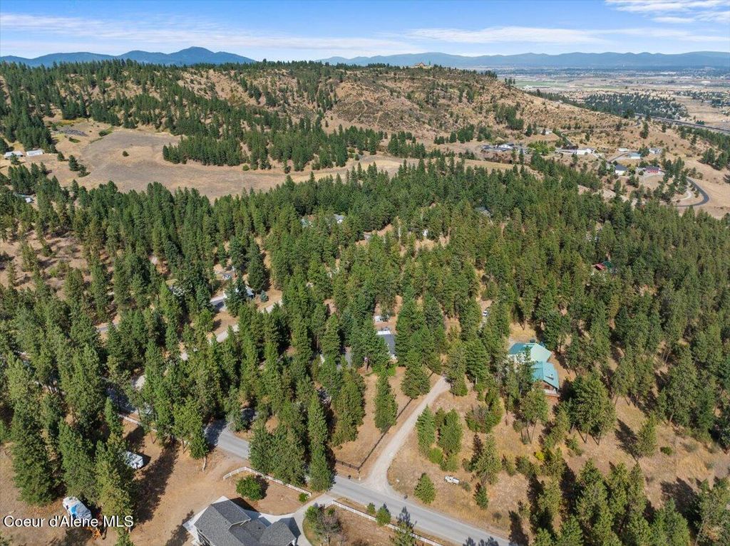 Photo of 6910 HARVARD Rd, Newman Lake, WA 99025 (MLS # 25-8239)