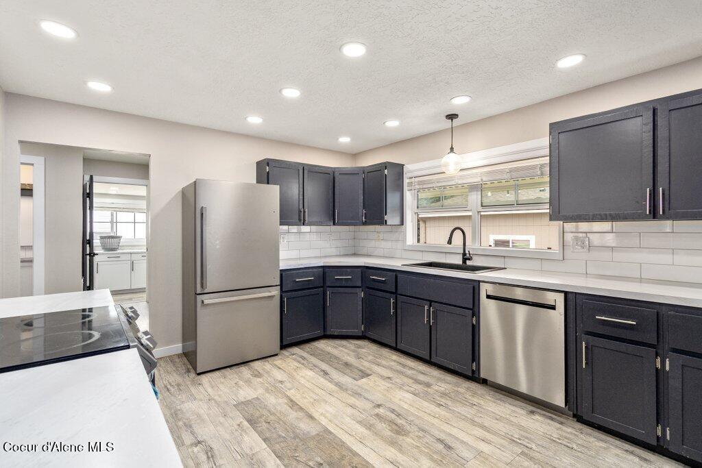 Photo of 807 Garden Ave, Osburn, ID 83849 (MLS # 26-8272)