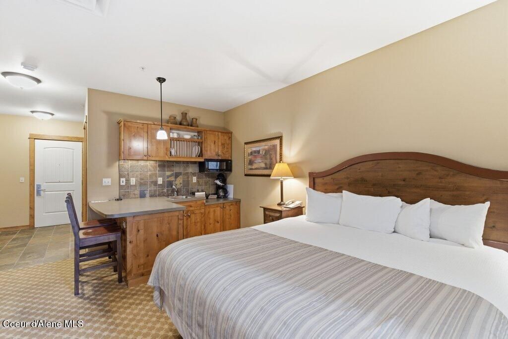 Photo of 602 Bunker Ave # 215, Kellogg, ID 83837 (MLS # 26-2468)