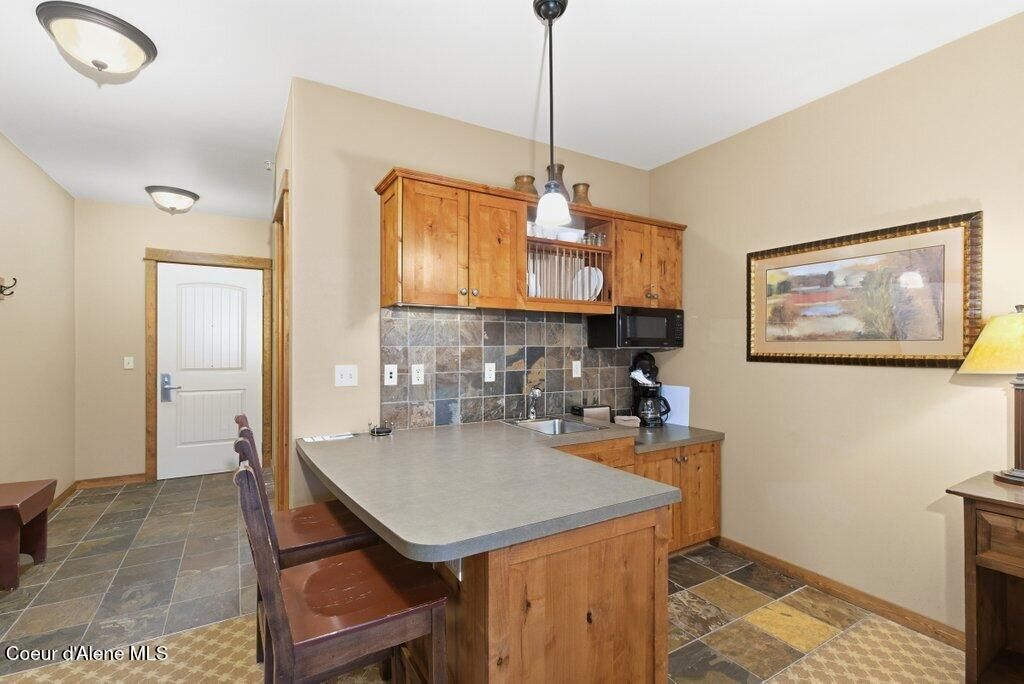 Photo of 602 Bunker Ave # 215, Kellogg, ID 83837 (MLS # 26-2468)