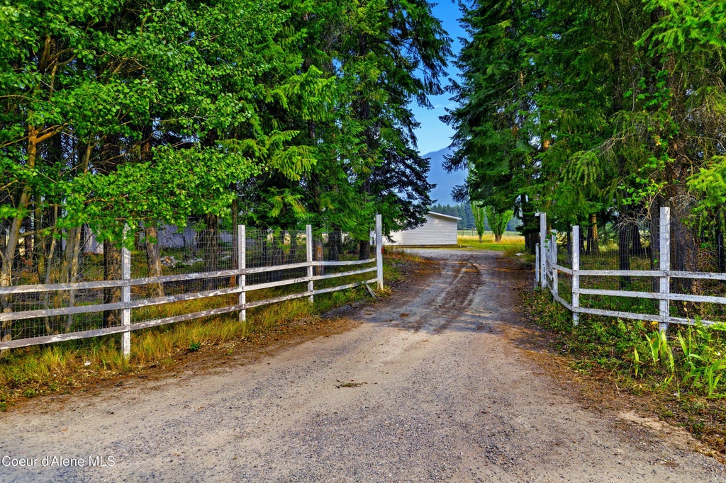 Photo of 3203 Paradise Valley Valley, Bonners Ferry, ID 83805 (MLS # 26-8475)