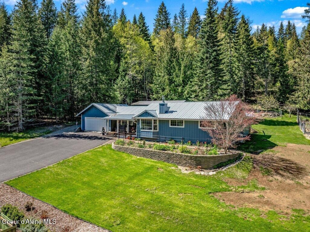 Photo of 6364 Bottle Bay Rd, Sagle, ID 83860 (MLS # 26-4151)