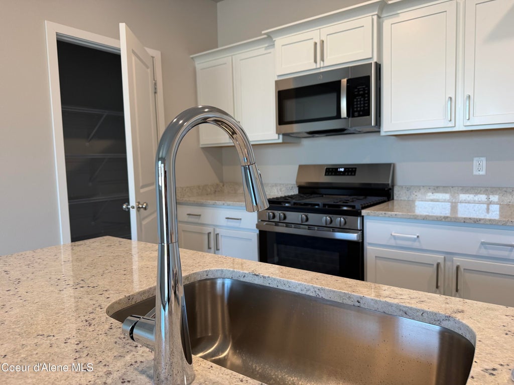 Photo of 4545 Rare Fox Ave, Post Falls, ID 83854 (MLS # 26-9349)