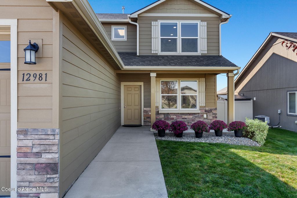 Photo of 12981 GONDOLA St, Rathdrum, ID 83858 (MLS # 25-9835)