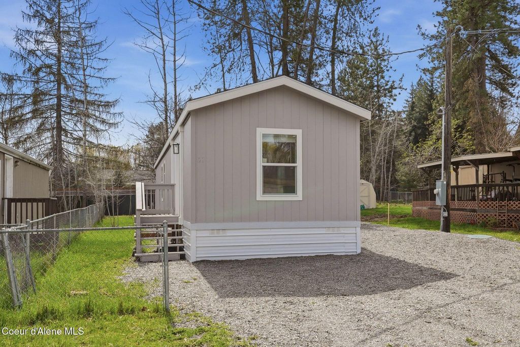 Photo of 11776 Hauser Lake Lake #SPC 21, Hauser, ID 83854 (MLS # 26-3875)