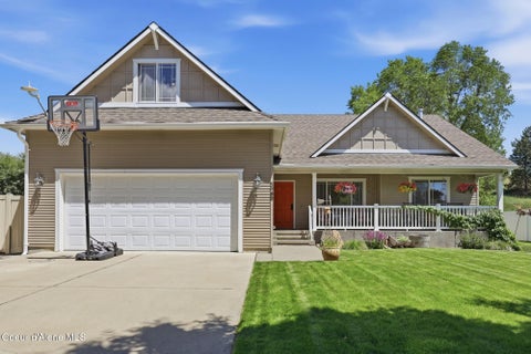 Photo of 1460 WILLAMETTE DR, Post Falls, ID 83854 (MLS # 26-6159)