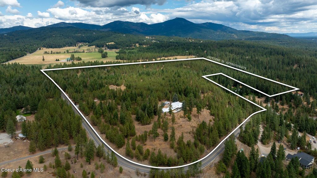Photo of 11470 CHURCH Rd, Rathdrum, ID 83858 (MLS # 25-8270)