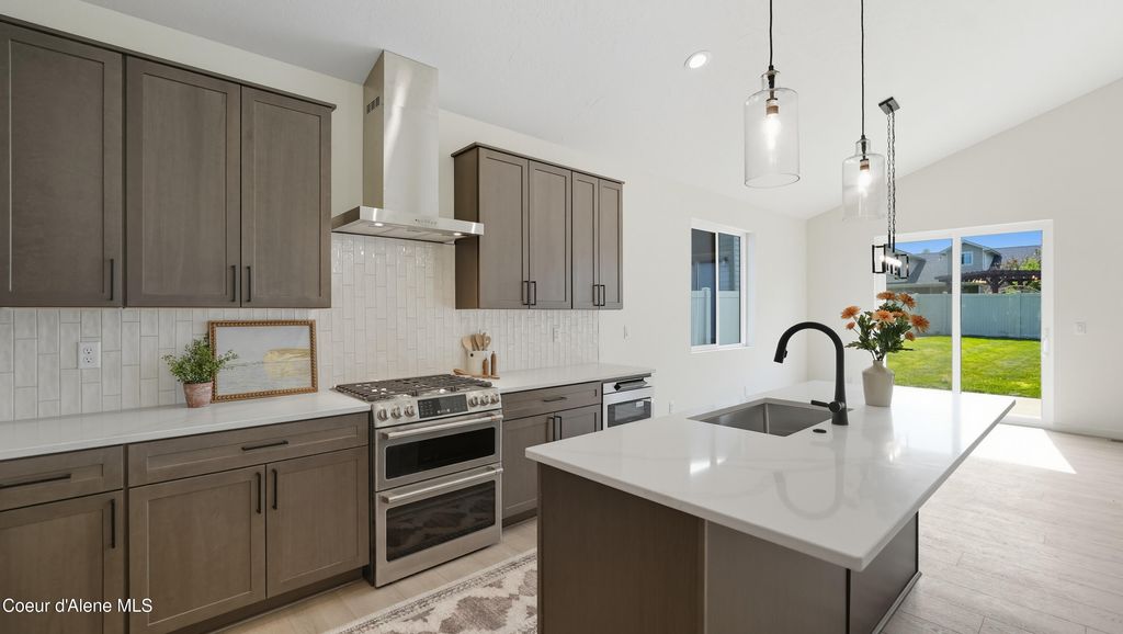 Photo of 6696 Portrush Dr, Rathdrum, ID 83858 (MLS # 26-965)