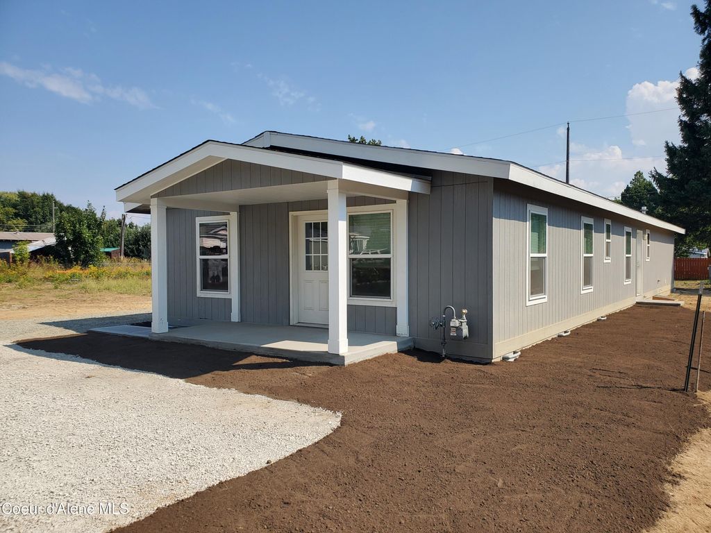 Photo of 230 Ash St, Ponderay, ID 83852 (MLS # 26-1046)