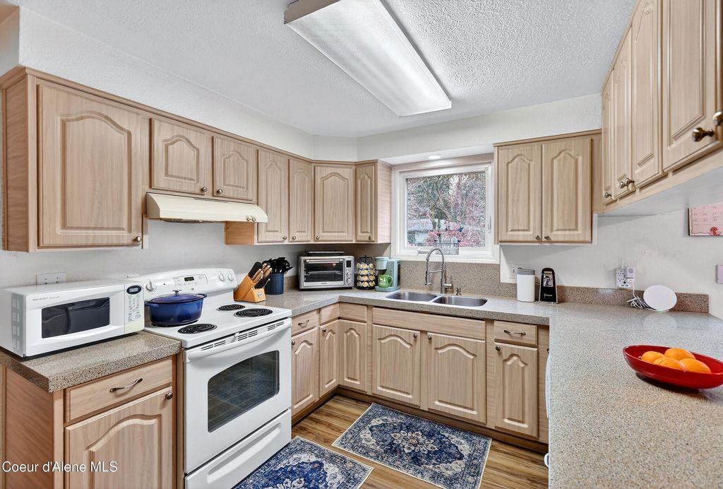 Photo of 5678 Pinegrove, Coeur dAlene, ID 83815 (MLS # 26-1604)