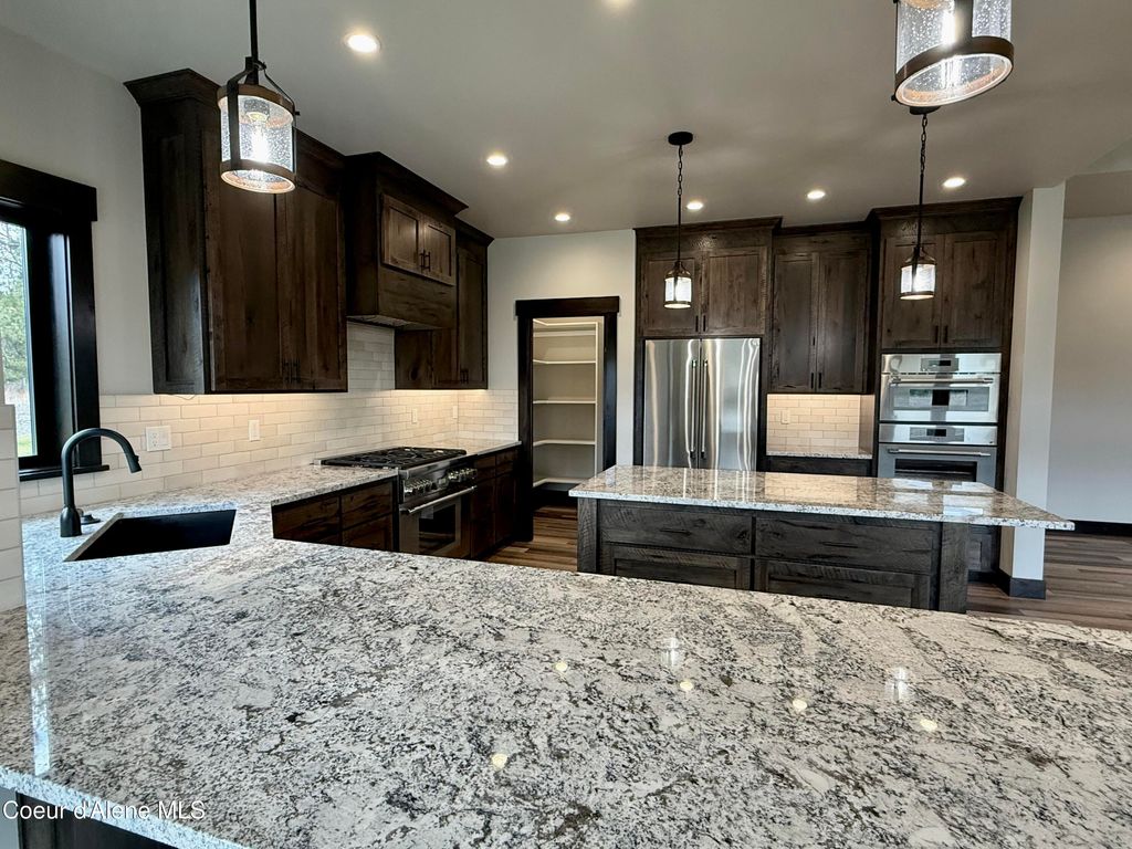 Photo of 21449 Stonemason, Rathdrum, ID 83858 (MLS # 26-3941)