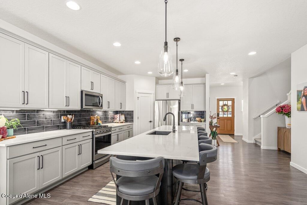 Photo of 7060 Roche Dr, Coeur dAlene, ID 83815 (MLS # 26-2385)