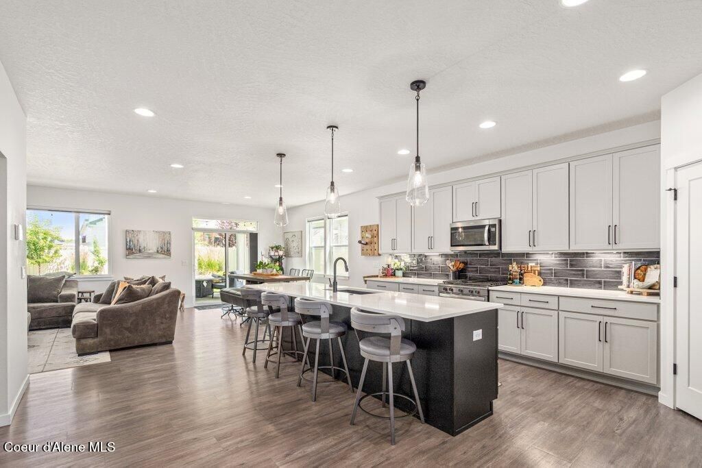 Photo of 7060 Roche Dr, Coeur dAlene, ID 83815 (MLS # 26-2385)