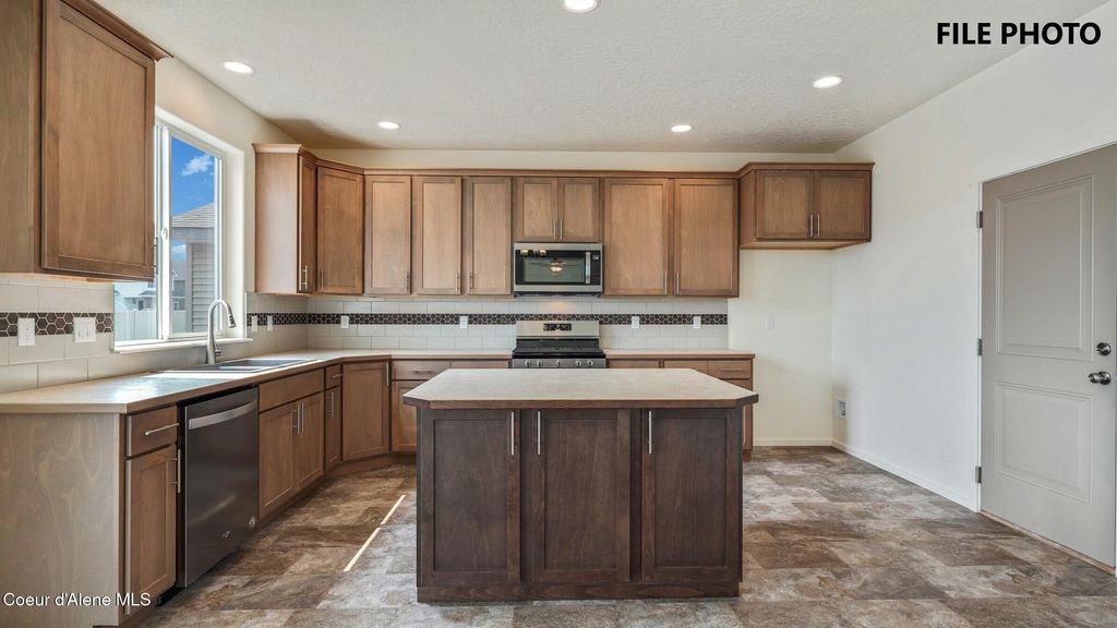 Photo of 1892 WOLLASTON Dr, Post Falls, ID 83854 (MLS # 26-3416)