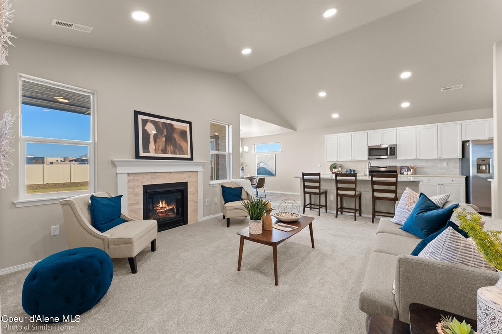Photo of 12212 Rochester Ave, Post Falls, ID 83854 (MLS # 26-8052)