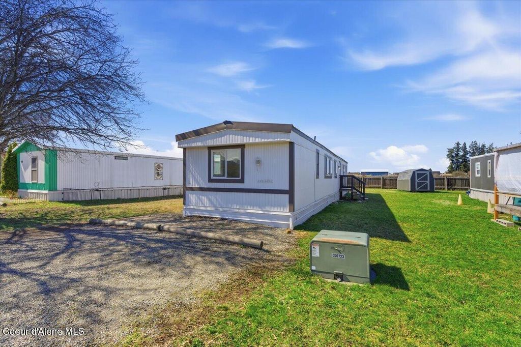 Photo of 10657 Benoit St, Hayden, ID 83835 (MLS # 26-2984)