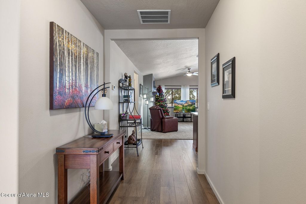 Photo of 1042 Allenby Ave, Post Falls, ID 83854 (MLS # 25-11396)