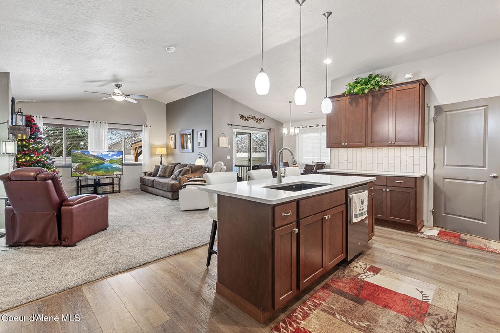 Photo of 1042 Allenby Ave, Post Falls, ID 83854 (MLS # 25-11396)