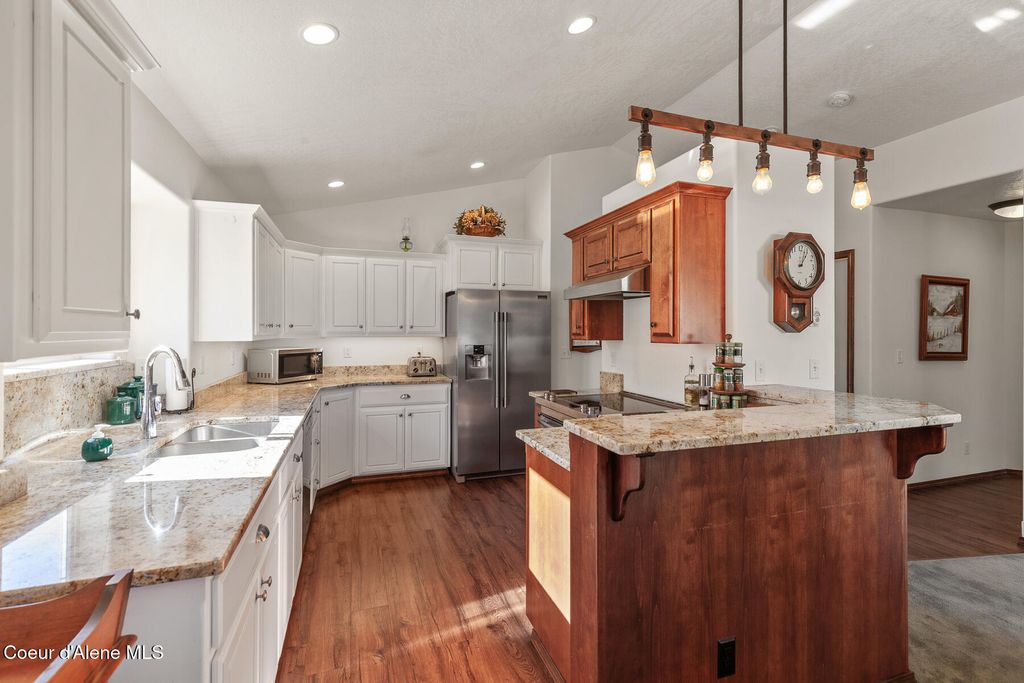 Photo of 8658 Indywood Dr, Hayden, ID 83835 (MLS # 25-10483)