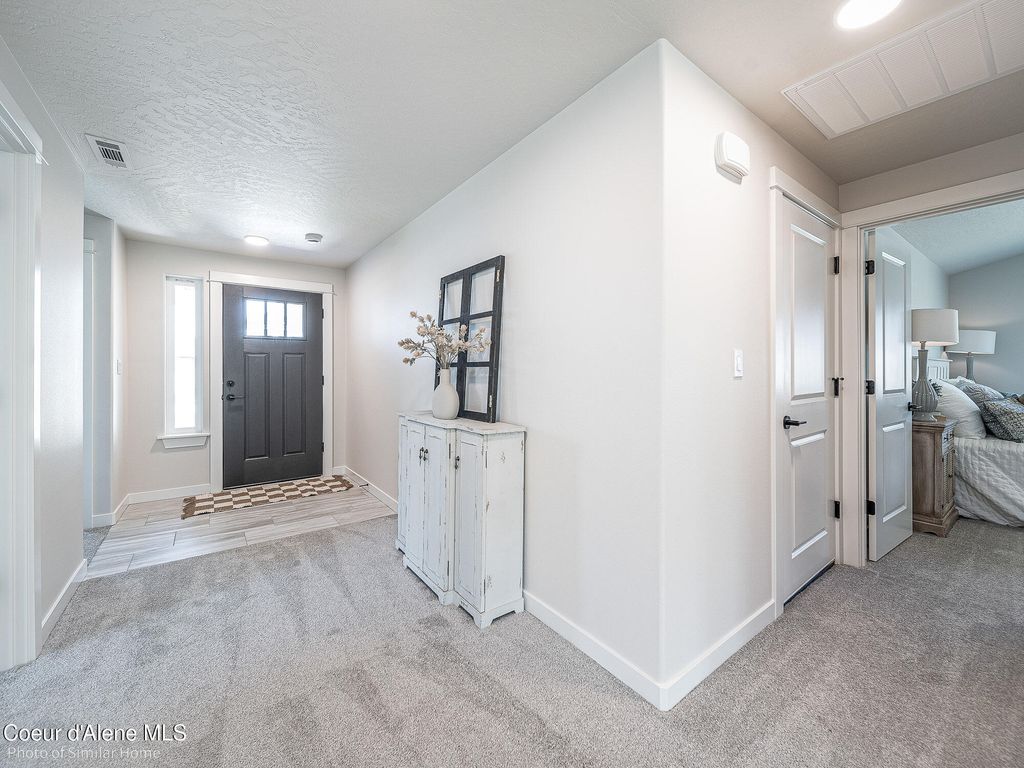 Photo of 1563 McKelvy, Post Falls, ID 83854 (MLS # 25-8819)