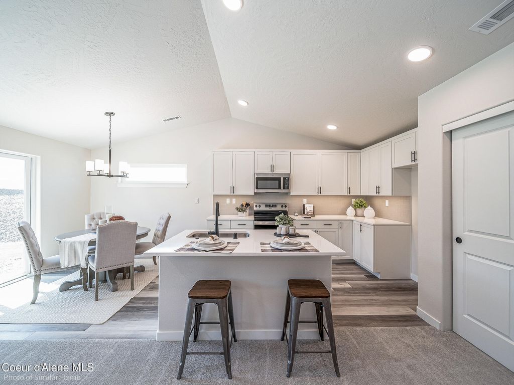 Photo of 1563 McKelvy, Post Falls, ID 83854 (MLS # 25-8819)