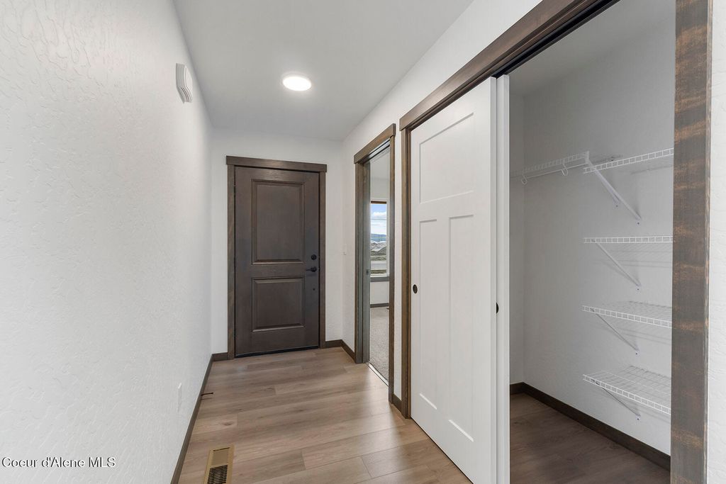 Photo of 9041 Swather Ave, Rathdrum, ID 83858 (MLS # 25-11054)