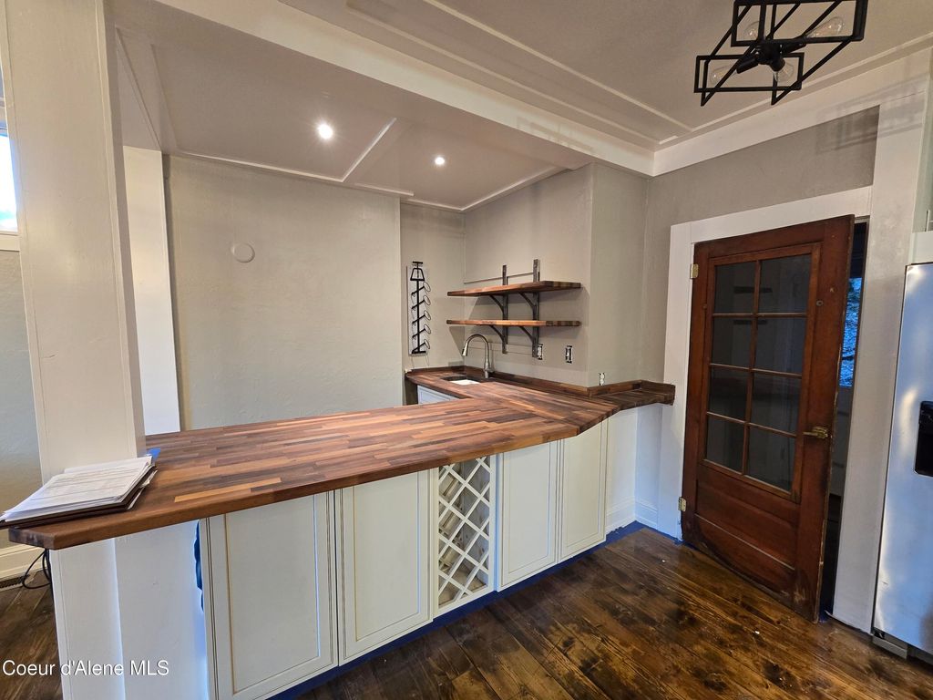 Photo of 118 River, Wallace, ID 83873 (MLS # 26-3456)