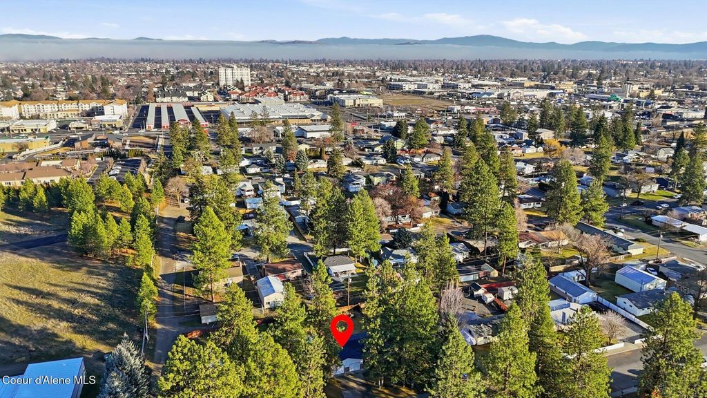 Photo of 7016 Whitehouse St, Spokane, WA 99208 (MLS # 26-1220)