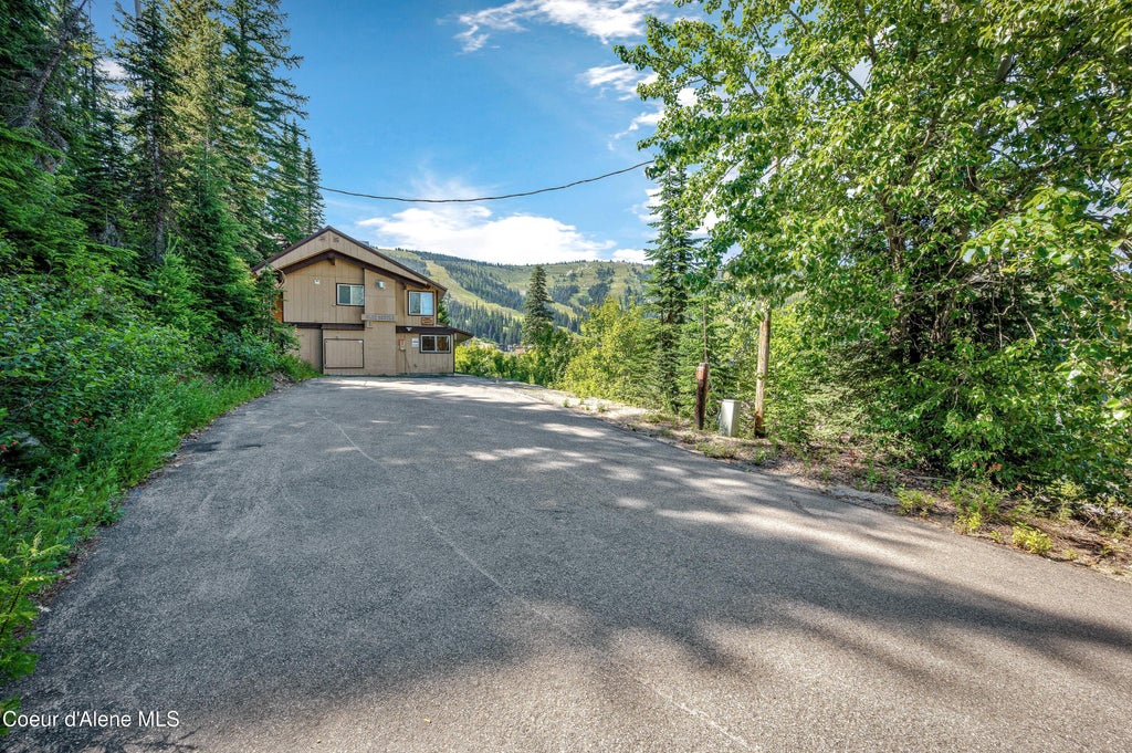 Photo of 216 Mogul Hill Hill # 102, Sandpoint, ID 83864 (MLS # 26-7405)