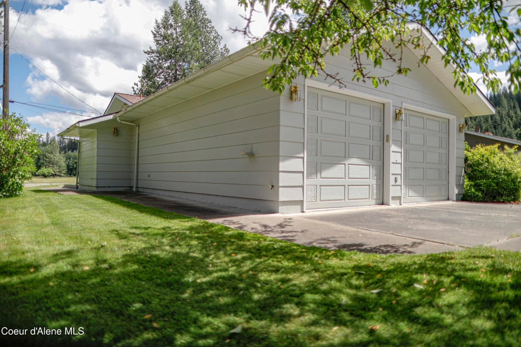 Photo of 301 Woodland Dr, Pinehurst, ID 83850 (MLS # 26-5774)