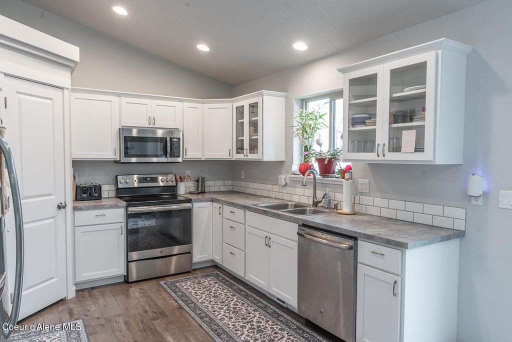 Photo of 1324 Yellowstone Ave, Post Falls, ID 83854 (MLS # 26-2512)