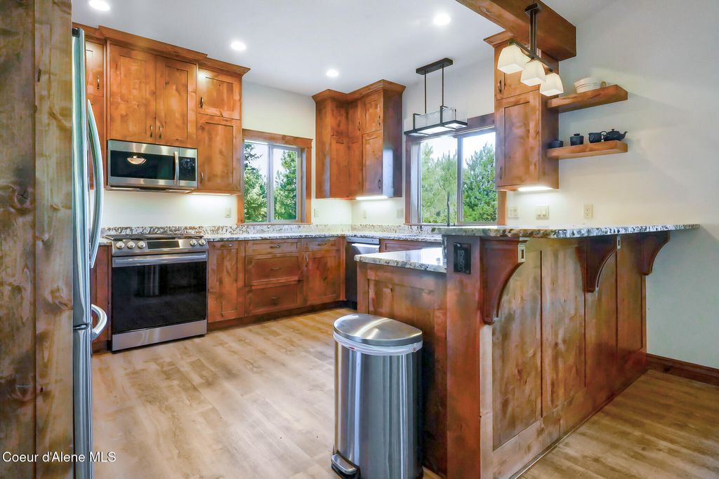 Photo of 273 Paradise Valley Valley, Bonners Ferry, ID 83805 (MLS # 26-1095)