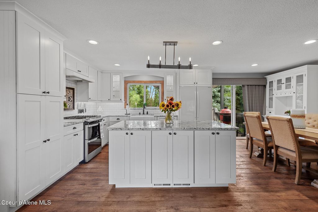 Photo of 9636 Idaho Rd, Post Falls, ID 83854 (MLS # 25-8282)