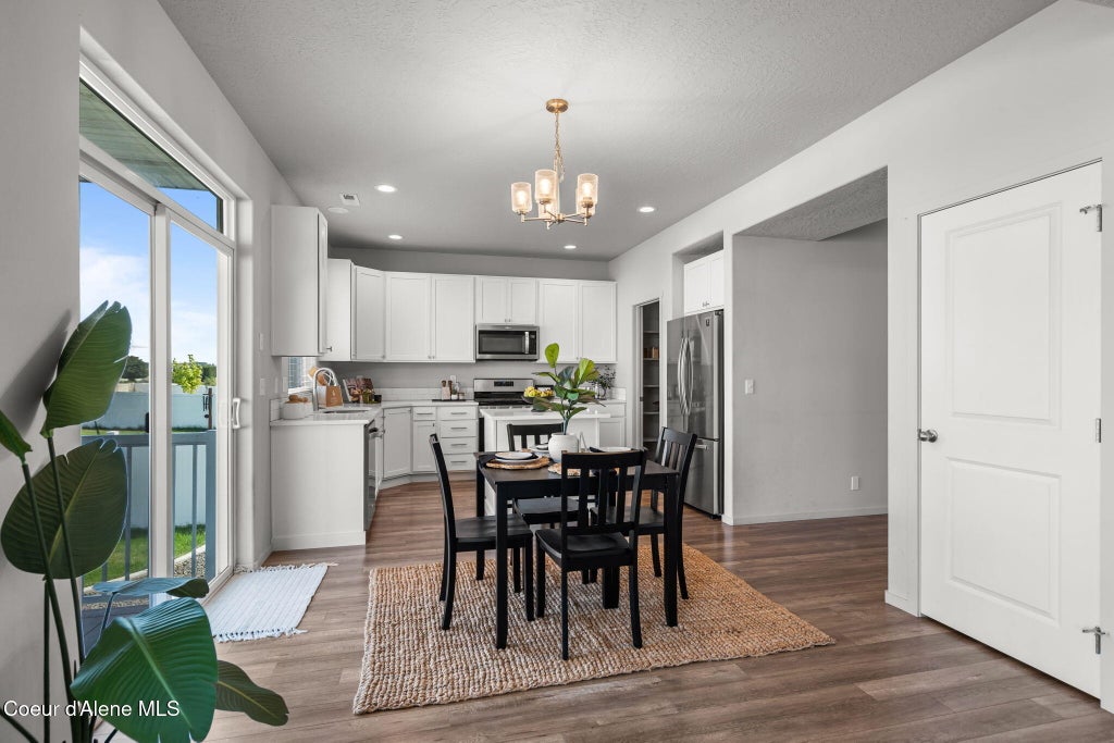 Photo of 9798 Heston Loop, Hayden, ID 83835 (MLS # 26-8096)