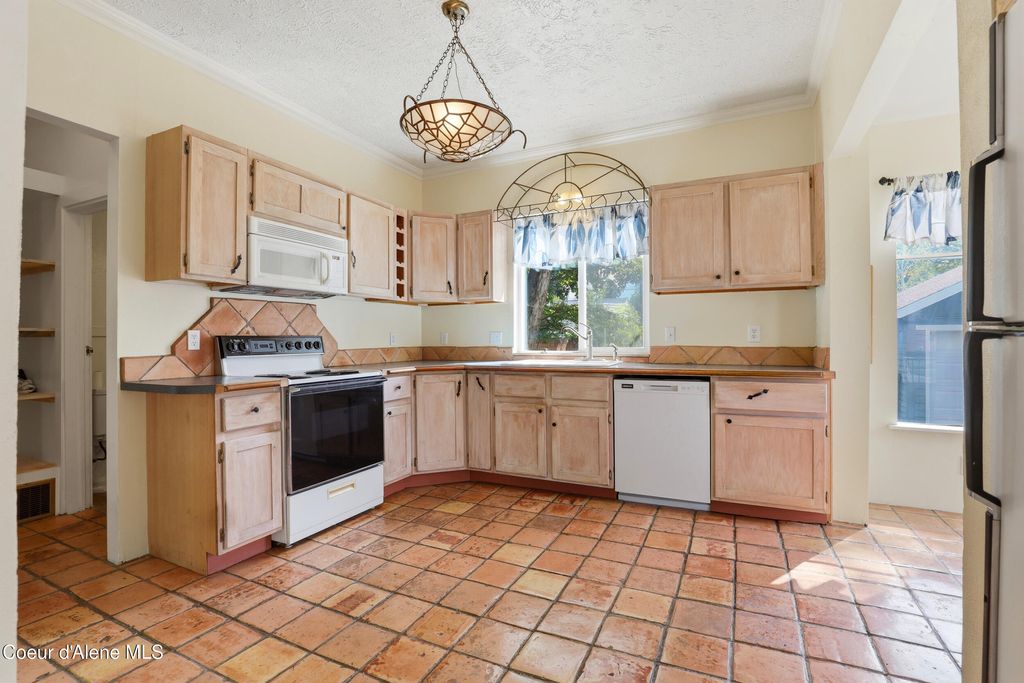 Photo of 816 5th PL, Coeur dAlene, ID 83814 (MLS # 26-4961)
