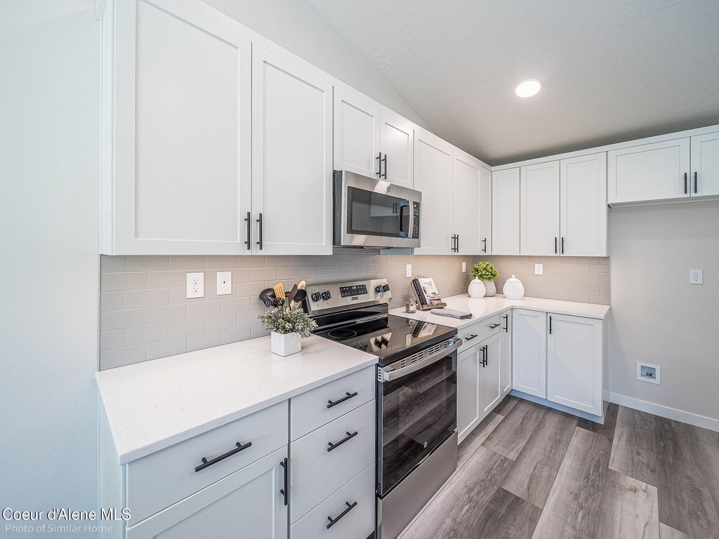 Photo of 12157 Kilkenny Dr, Post Falls, ID 83854 (MLS # 26-5913)