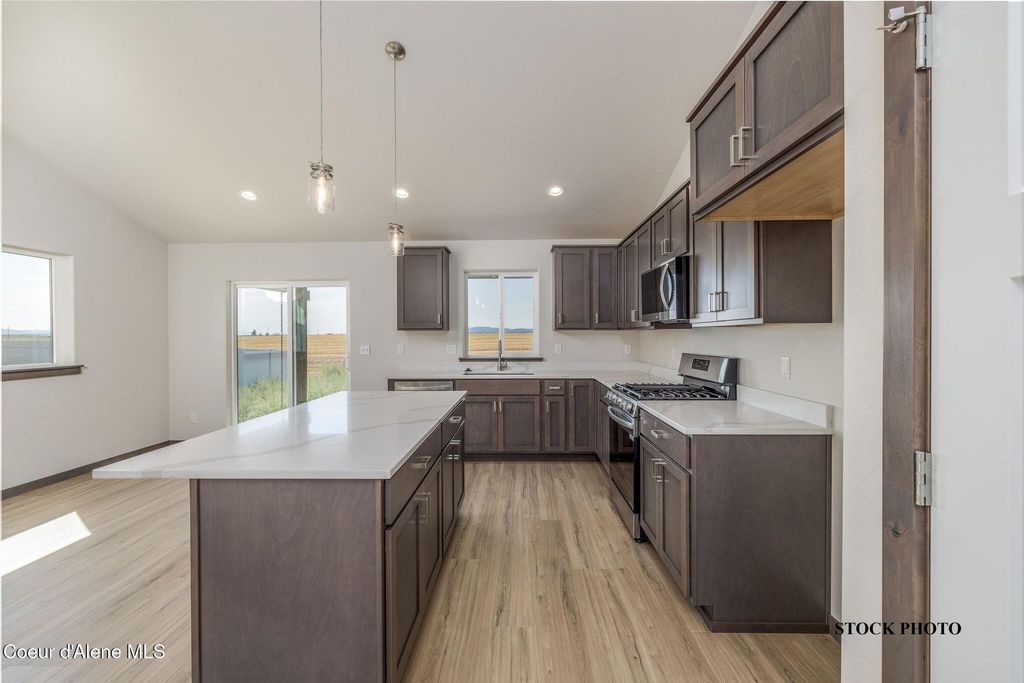 Photo of 11673 SIMMONS LN, Rathdrum, ID 83858 (MLS # 26-4449)