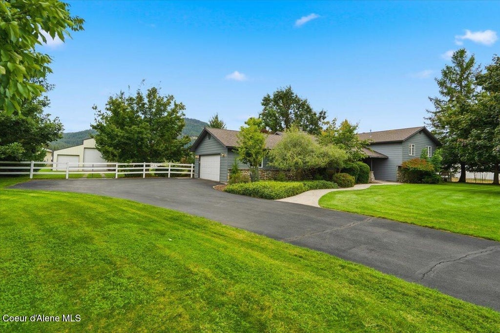 Photo of 7424 Mount Carrol ST, Dalton Gardens, ID 83815 (MLS # 26-9358)