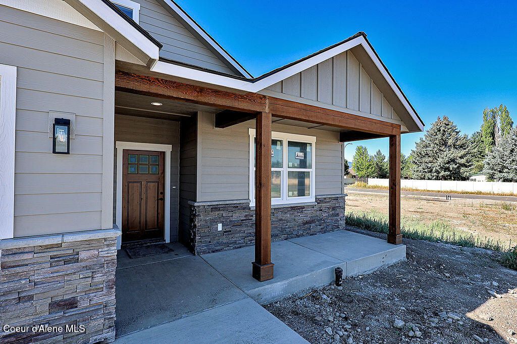 Photo of 4450 Savea Ln, Post Falls, ID 83854 (MLS # 25-9890)