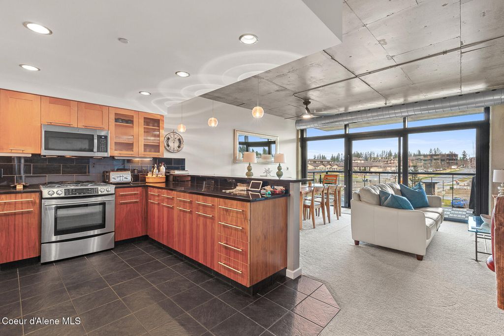 Photo of 1884 BELLERIVE Ln #313, Coeur dAlene, ID 83814 (MLS # 26-3929)