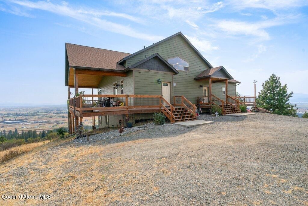 Photo of 10653 Payment Peak Rd, Hauser, ID 83854 (MLS # 26-2800)