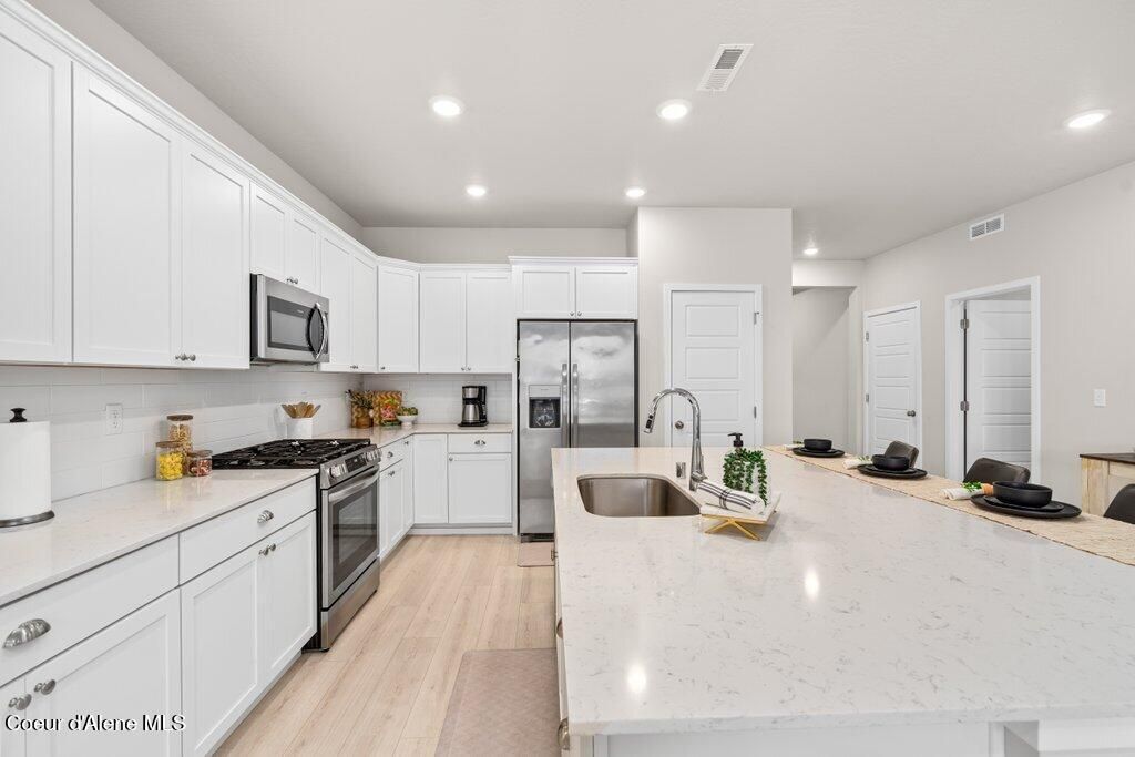 Photo of 3062 Marni Rd, Post Falls, ID 83854 (MLS # 26-1303)