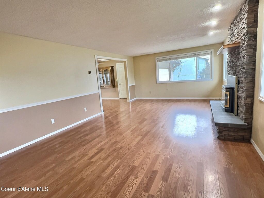 Photo of 1051 Wild Rose Ln, Post Falls, ID 83854 (MLS # 26-3399)