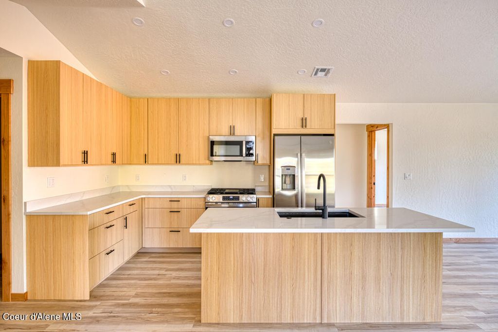 Photo of 296 Jasper Loop, Ponderay, ID 83852 (MLS # 25-11231)