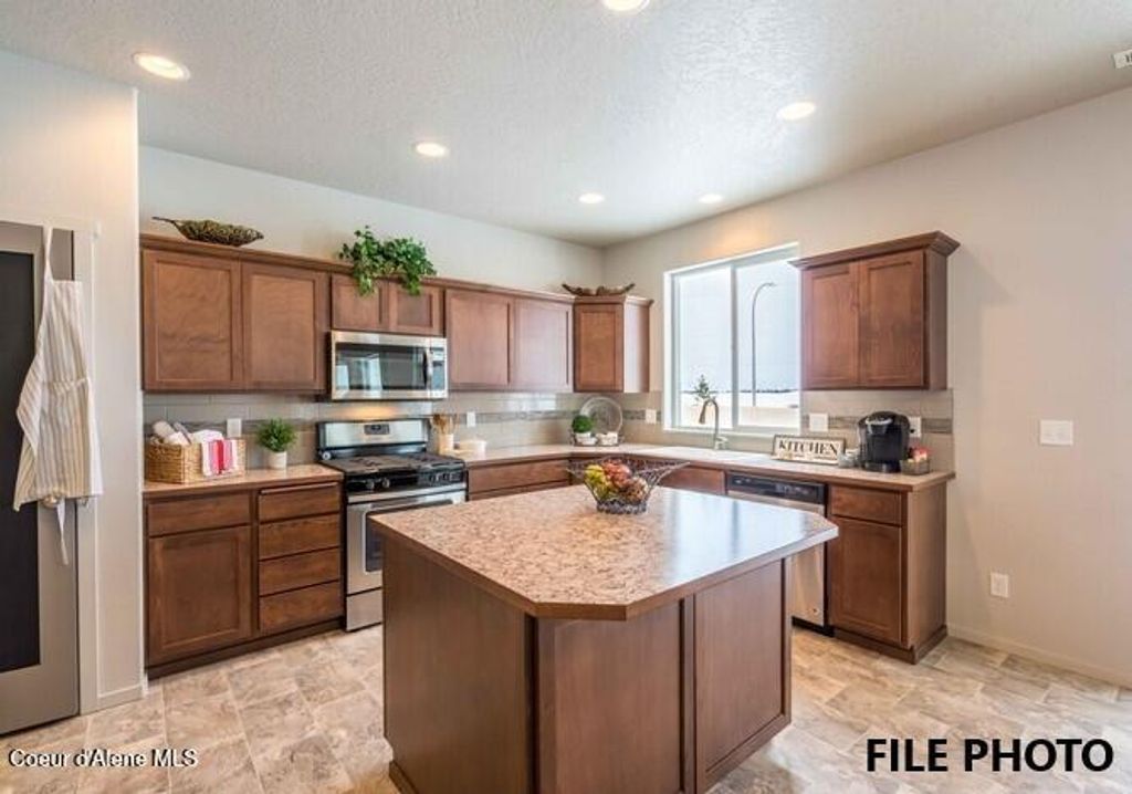Photo of 1494 ALLENBY AVE, Post Falls, ID 83854 (MLS # 26-4925)