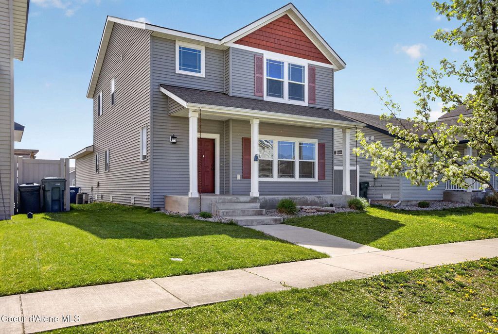 Photo of 8256 Woodworth St, Post Falls, ID 83854 (MLS # 26-2616)