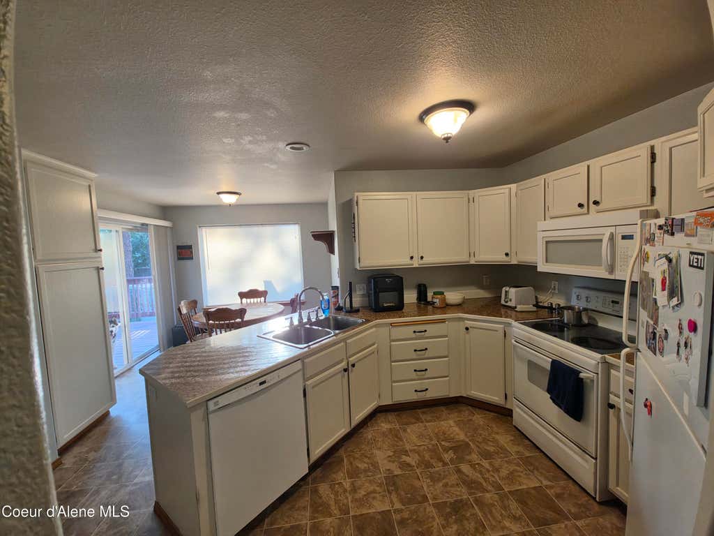 Photo of 106 Riverwood Ct, Post Falls, ID 83854 (MLS # 26-7749)